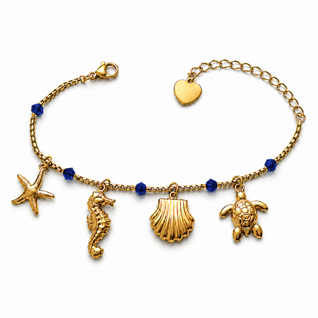 Goldenes Sommer Charm Armband mit Seestern, Muschel, Schildkröte und blauen Perlen